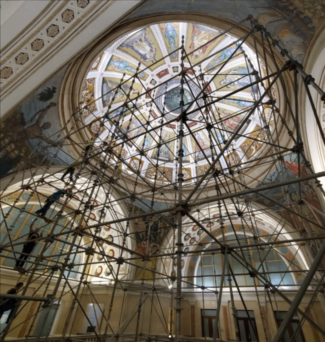 Historic interior dome restoration supported by scaffolding